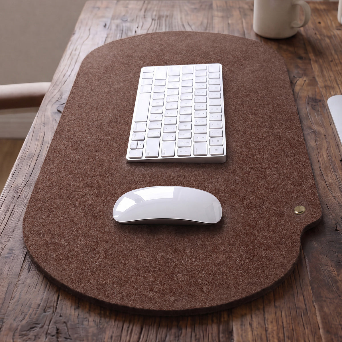 Brown Merino wool felt desk pad in minimalist workspace